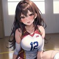 しゃがみ込むバレー女子 4枚目