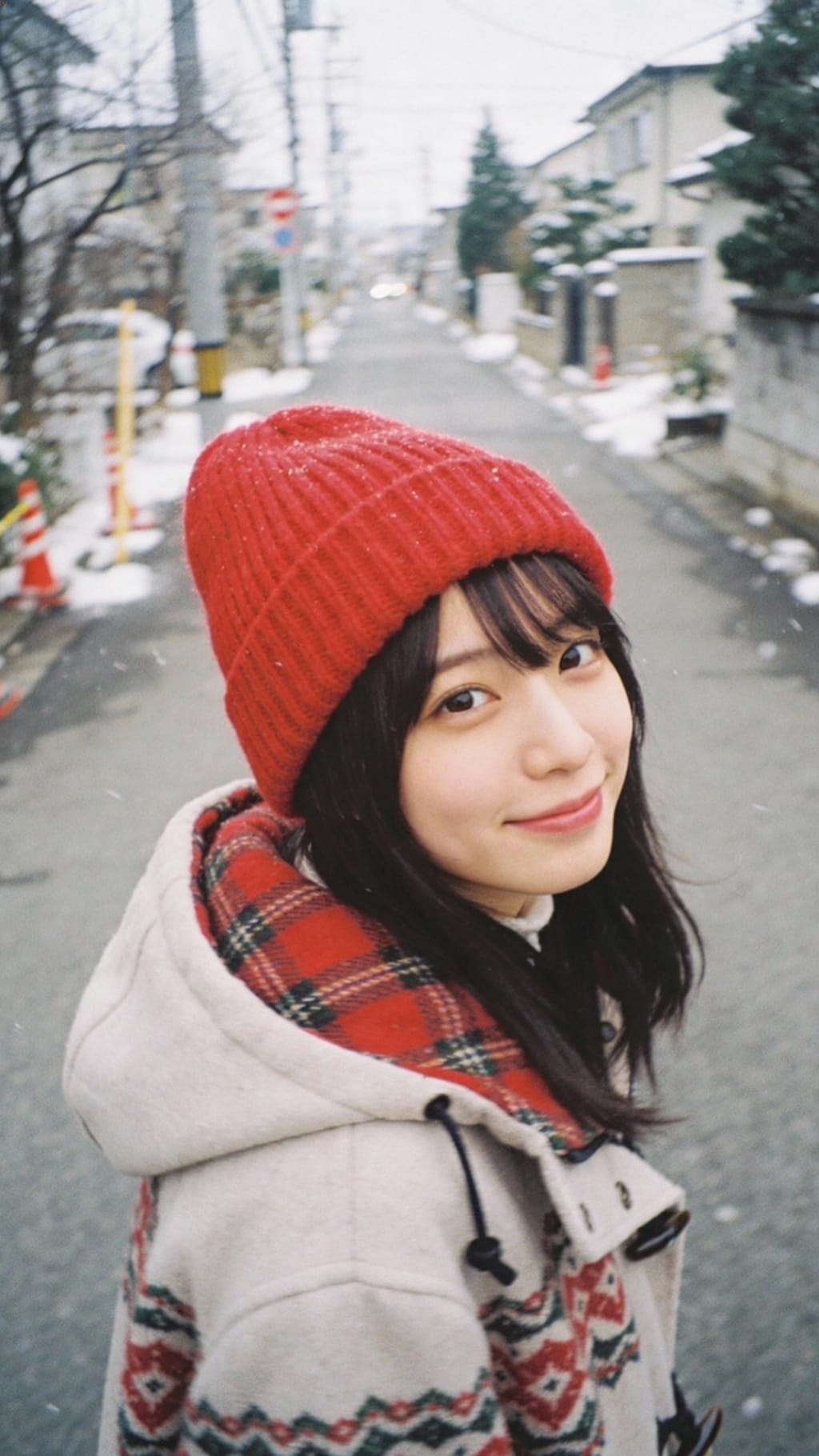 Scarlet Warmth on a Snowy Path