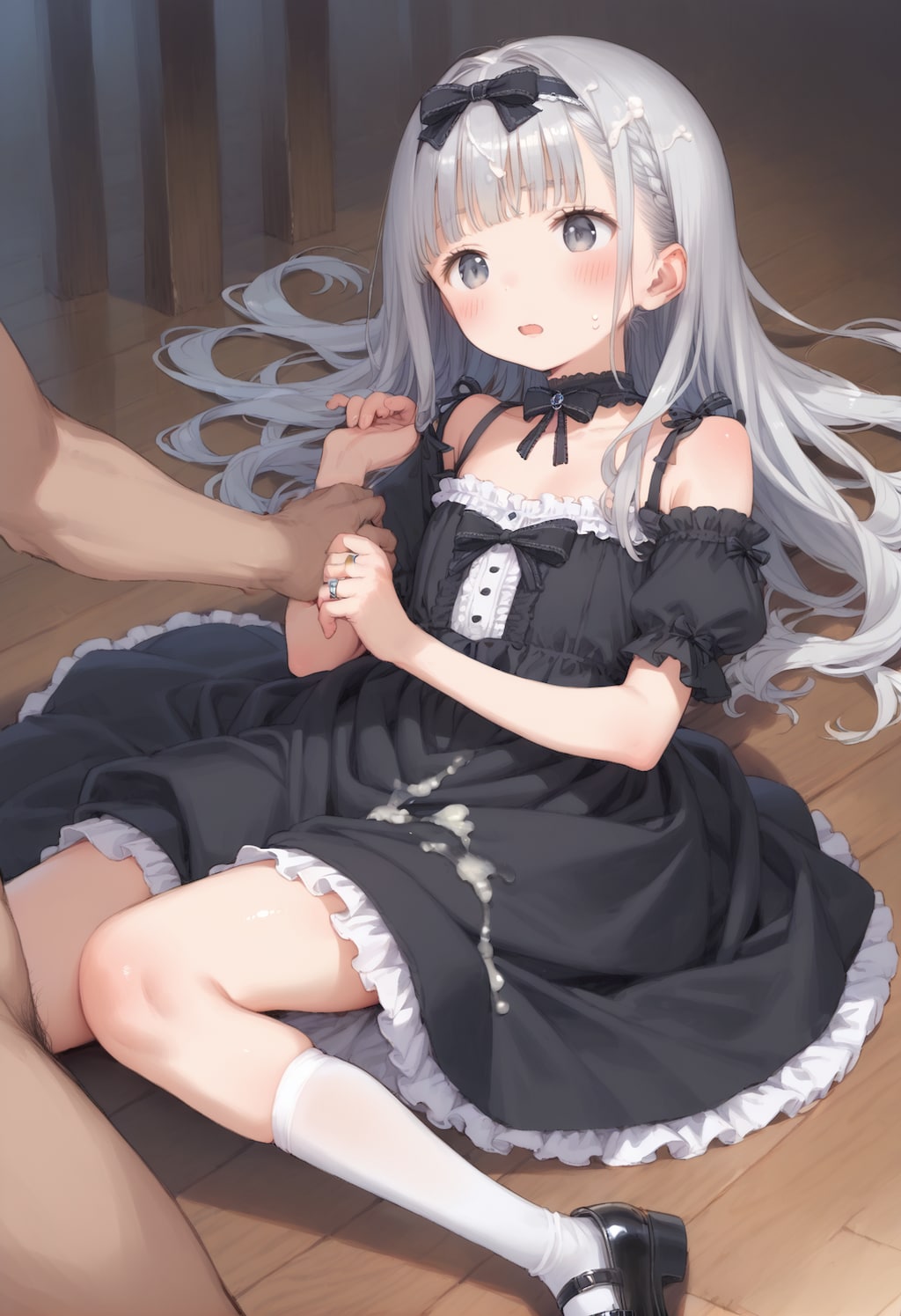 押さえつけられる子