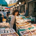 魚を買う女性 3枚目
