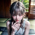 アステカの太陽神をあしらったシルバーリングが畳でくつろぐ 2枚目