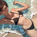浅瀬で寝転ぶ日焼け少女 2枚目