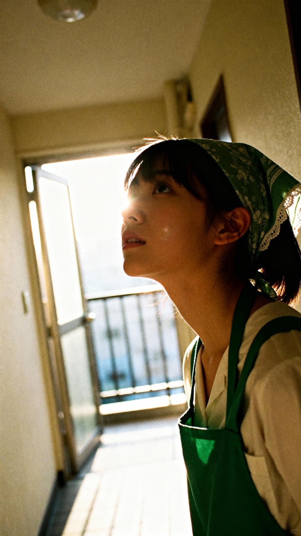 Green Bandana and a Pensive Gaze