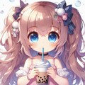 タピオカミルクティーを飲んでる小さな女の子 3枚目
