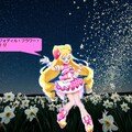 キュアアイドル、水仙の花の手前で歌いながら踊る 3枚目