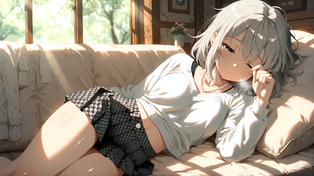ソファで眠たげな女の子