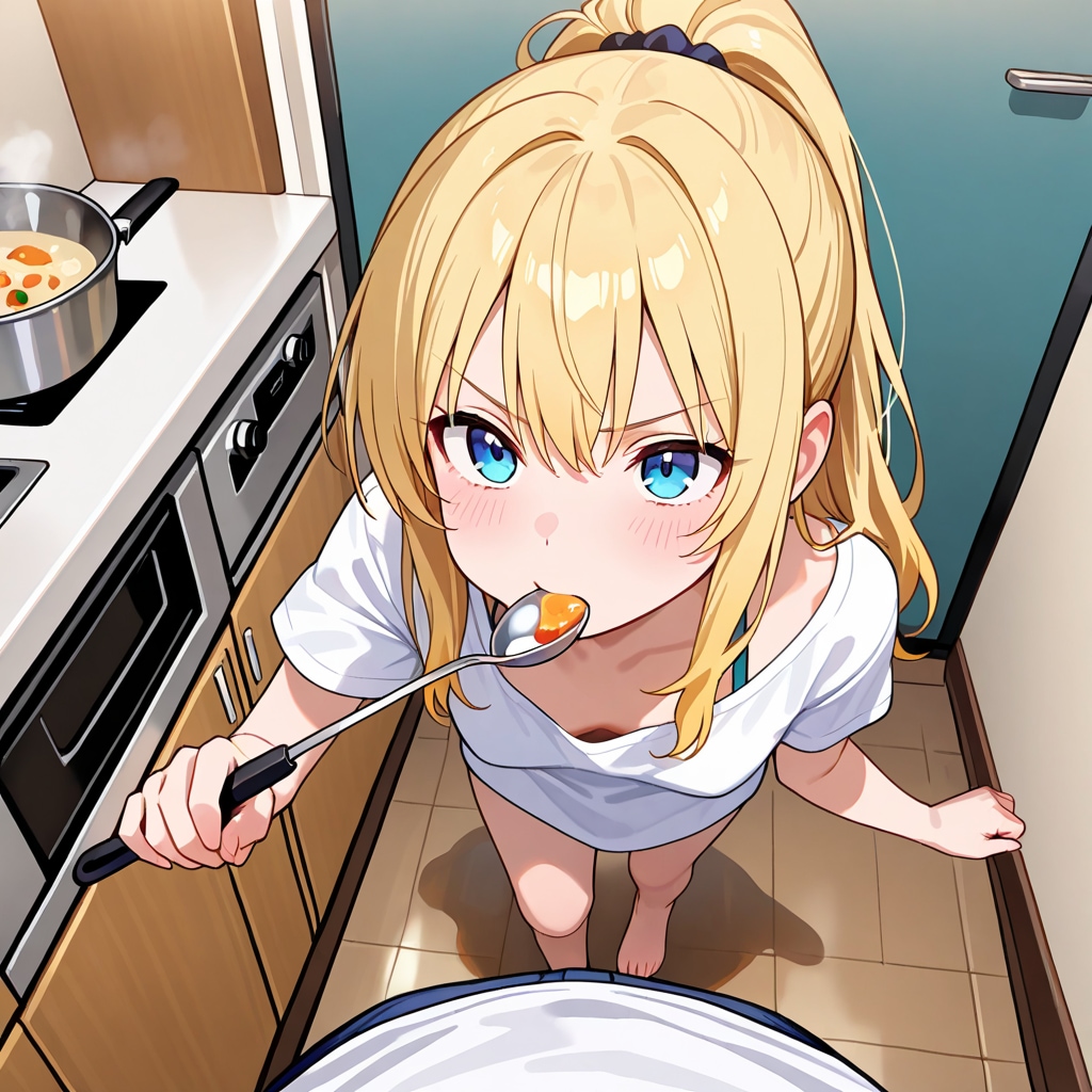 料理を作る彼シャツの彼女