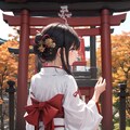神社では巫女が祈りをささげている。 6枚目