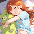 くまのぬいぐるみを抱いて寝る女の子 5枚目