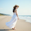 ビーチを歩く白いドレスの女性 8枚目