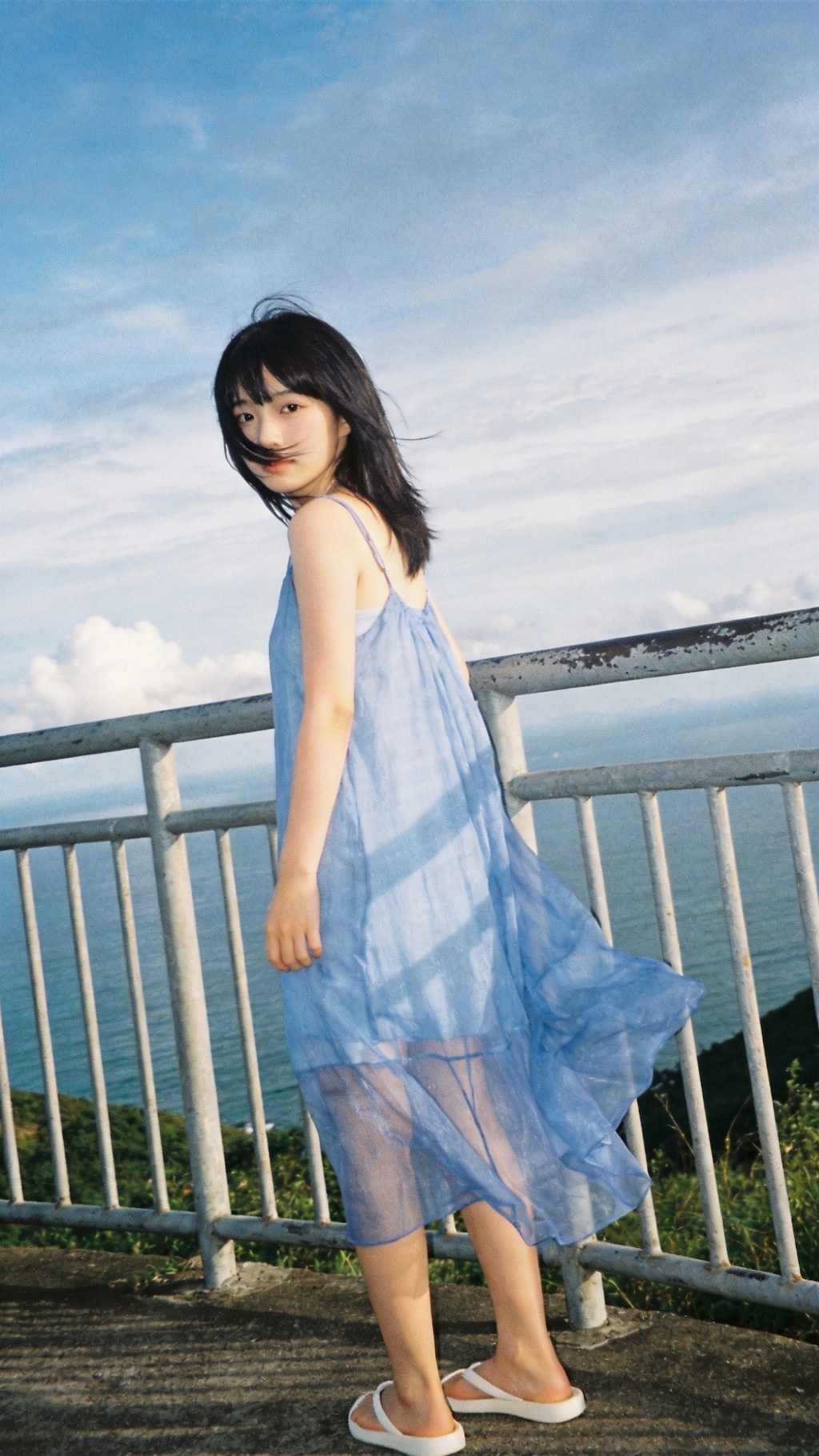 Blue Dress Above the Endless Sea