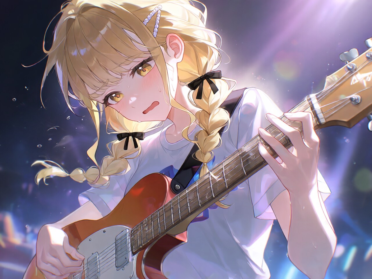 ステージでギターを演奏することね