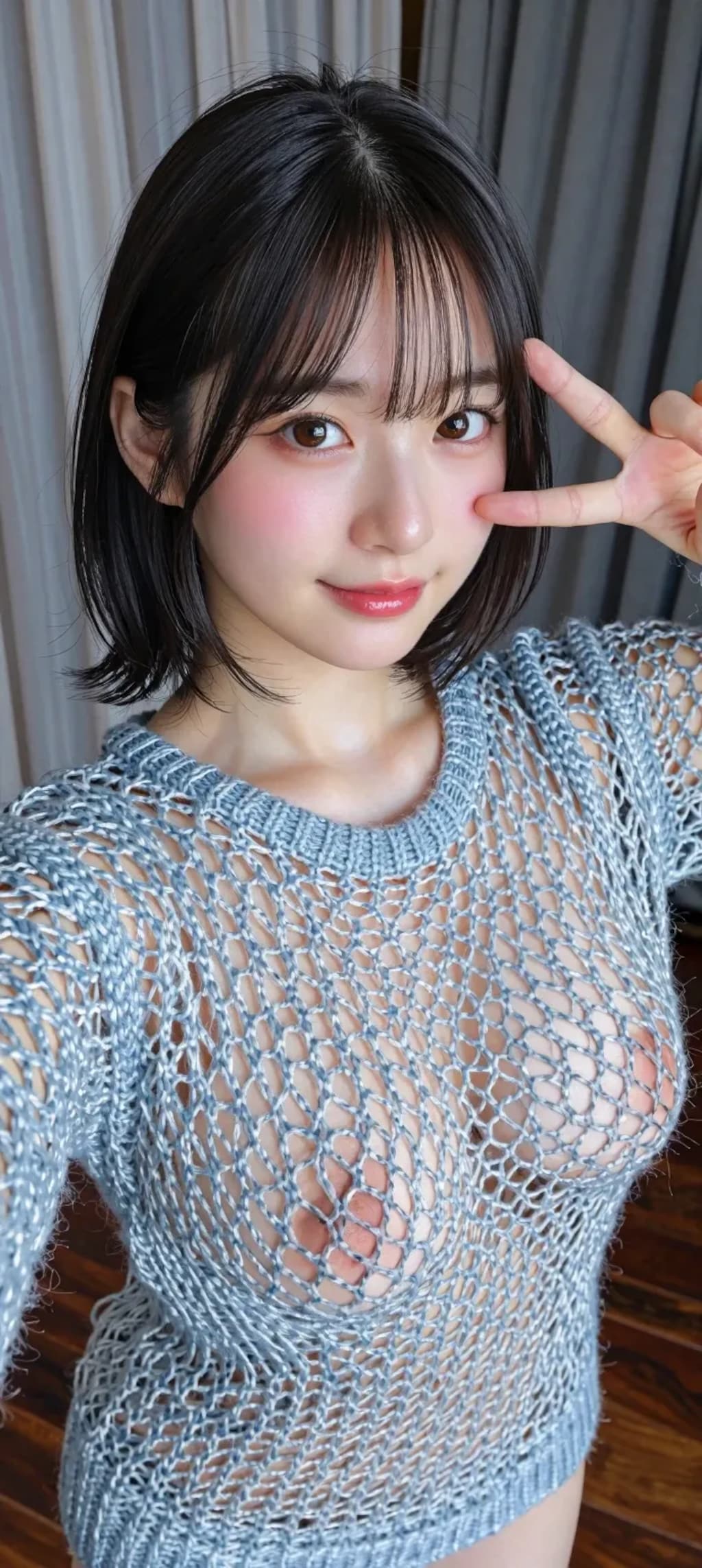 網目が大きなセーターを着た女の子のヌード